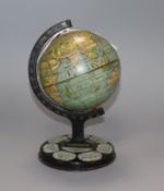 A 1930's-40's child's tin globe on stand