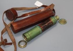 A leather cased three draw telescope