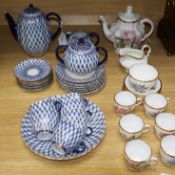 A Lomonosov 'Cobalt Net' coffee service for six and a Spode coffee service decorated with pink