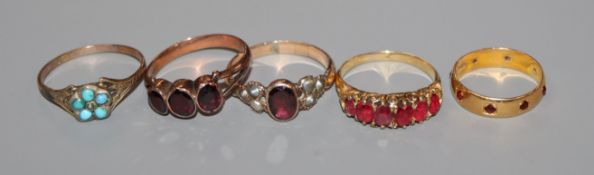 Five assorted Victorian and later yellow metal and gem set dress rings including one 22ct gold.