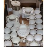 A Wedgwood Susie Cooper 'Saturn' pattern coffee set and a 'Venetia' pattern service, comprising
