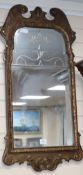 A fretwork mirror with etched crown W.55cm