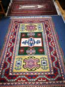 A red and green ground Hamadan rug and an Eastern prayer rug 195 x 141cm and 185 x 123cm
