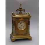 A 19th century gilt brass and silvered metal mantel clock, J W Benson, London, having white Roman