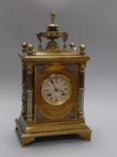 A 19th century gilt brass and silvered metal mantel clock, J W Benson, London, having white Roman