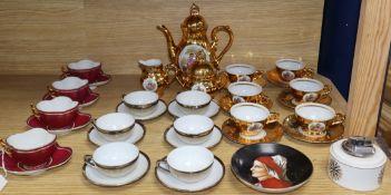 Four Austrian porcelain cups and saucers, a gilt coffee service, an Italian saucer dish and