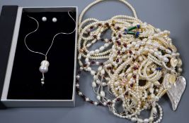 Ten assorted freshwater pearl necklaces and one other boxed necklace and earrings.