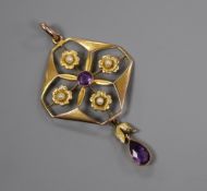 An early 20th century 9ct, amethyst and seed pearl drop pendant, 44mm.