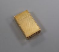 A Flamidor gold painted lighter