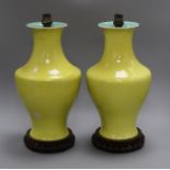 A pair of Chinese yellow ground vase table lamps (one a.f.)