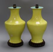 A pair of Chinese yellow ground vase table lamps (one a.f.)