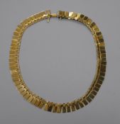 A 9ct gold fringe necklace, 42cm.