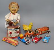 A Chad Valley tinplate racing car and a collection of other tinplate clockwork models, comprising