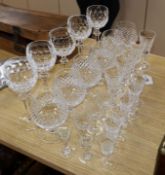 Five Waterford glass long stemmed goblets, six Waterford brandy glasses, ten Waterford liqueur and