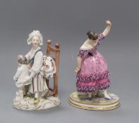 Two Vienna style porcelain figures of a mother and child and a dancer tallest 20cm