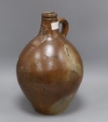 A 17th / 18th century Bellamine pottery flagon height 38cm