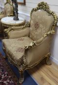 A large pair of Louis XV style gilt carved wood fauteuils