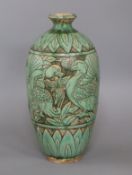 A Chinese Cizhou type green glazed 'mandarin duck' vase height 31cm