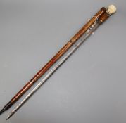 An 18th century French bone handled swordstick with engraved blade overall length 80cm