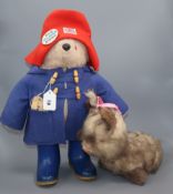 A Paddington Bear, with original clothes, Dunlop boots / label, very good condition and a