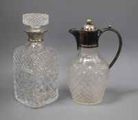 A silver collared glass decanter and stopper and an electroplate mounted claret jug