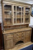 A glazed pine dresser W.150cm