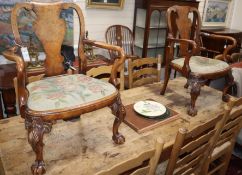 A pair of 1920's George I design walnut childs chairs