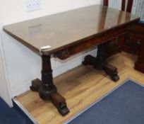 A Victorian carved rosewood library table
