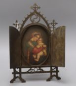 A late 19th century German porcelain plaque decorated with the Madonna & child, ormolu casement