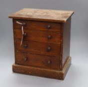 A late Victorian pine miniature chest of drawers height 33cm