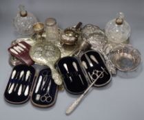 A silver hand mirror and a quantity of assorted plated wares.