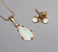 A yellow metal, white opal and diamond set pendant, on a 9ct chain and a pair of 585 and white