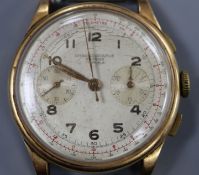 A gentleman's 1950's? Swiss 18k yellow metal chronograph wrist watch, no strap.