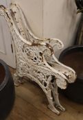 A pair of Victorian Coalbrookdale design cast iron bench ends W.65cm approx.