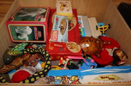 A quantity of 1960s and later tin plate clockwork toys, many boxed