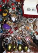 A mixed quantity of costume jewellery including a pair of white metal and paste earrings.