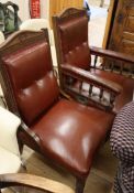 A pair of Victorian oak library chairs