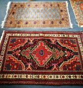 A Belouch rug and Persian design rug 129 x 80cm , 140 x 85cm