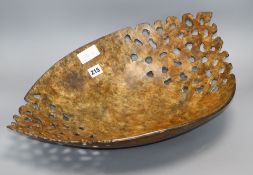 A modern design pieced iron bowl length 53cm