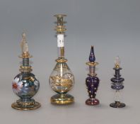 Four coloured glass scent bottles