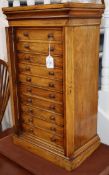 A Victorian walnut table top collector's Wellington chest W.92cm