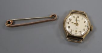 A lady's 9ct gold Rotary manual wind wrist watch (no strap) and a 9ct tie pin.