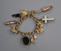 A 9ct gold charm bracelet, hung with ten assorted charms including a chalcedony set mourning