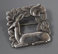 A Georg Jensen sterling 'kneeling deer with squirrel' square brooch, no. 318, 38mm.