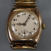 A gentleman's small 1920's 9ct gold Rolex wrist watch, on associated later bracelet.