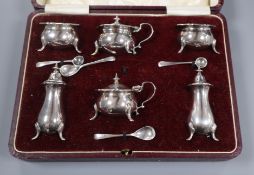 A cased George V silver six piece condiment set by Alexander Clark, Birmingham, 1925.