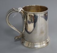 An early George I Britannia standard silver mug, Nathaniel Lock, London, 1715, with later