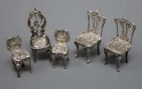 Two pairs of modern silver miniature chairs by Richards & Knight and an early 20th century silver