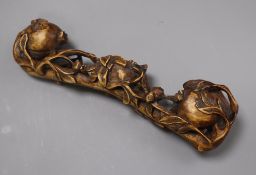 A Chinese carved wood sceptre length 35cm