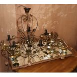 A hand wrought framed mirror, a pair of wall sconces and and a five branch electrolier